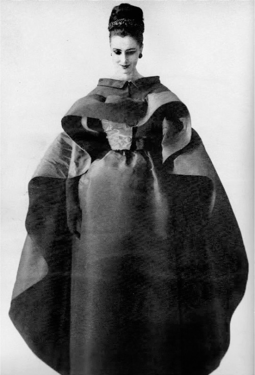 1961 Maggi Eckardt wearing a Cristóbal Balenciaga dress and cape, photographed by Tom Kublin for Harper’s Bazaar, November 1961