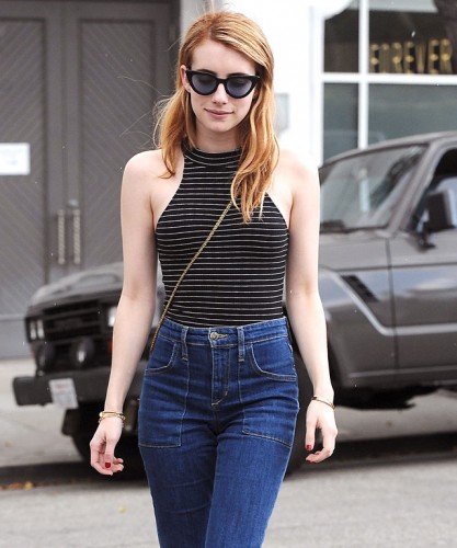 Mandatory Credit: Photo by Broadimage/REX/Shutterstock (5621290c) Emma Roberts Emma Roberts out and about, Los Angeles, America - 29 Mar 2016 Braless Emma Roberts shows it is all in the jeans as she turns heads in flares and revealing top in Beverly Hills